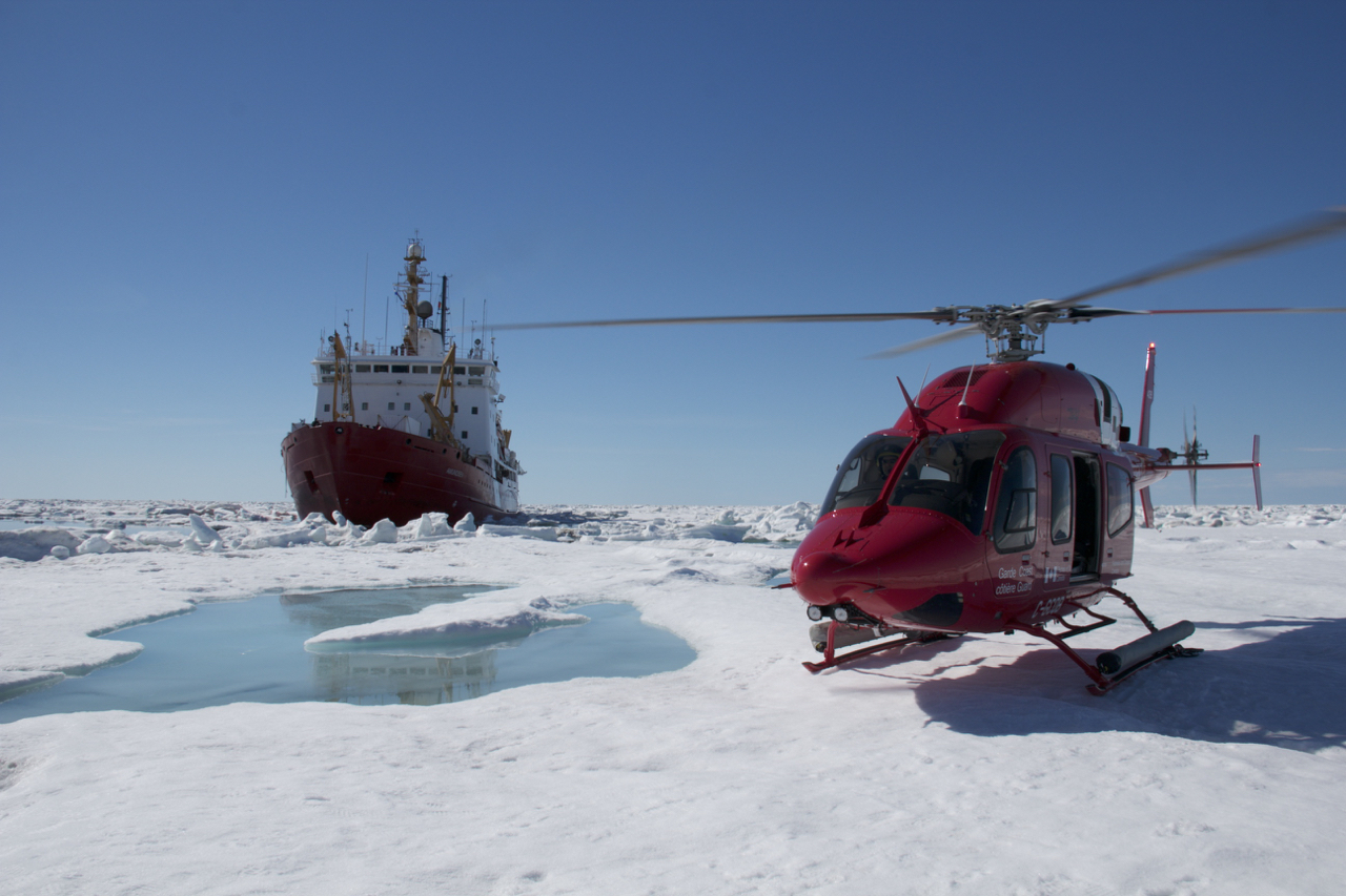 CCGS Amundsen and helicopter posing in Arctic