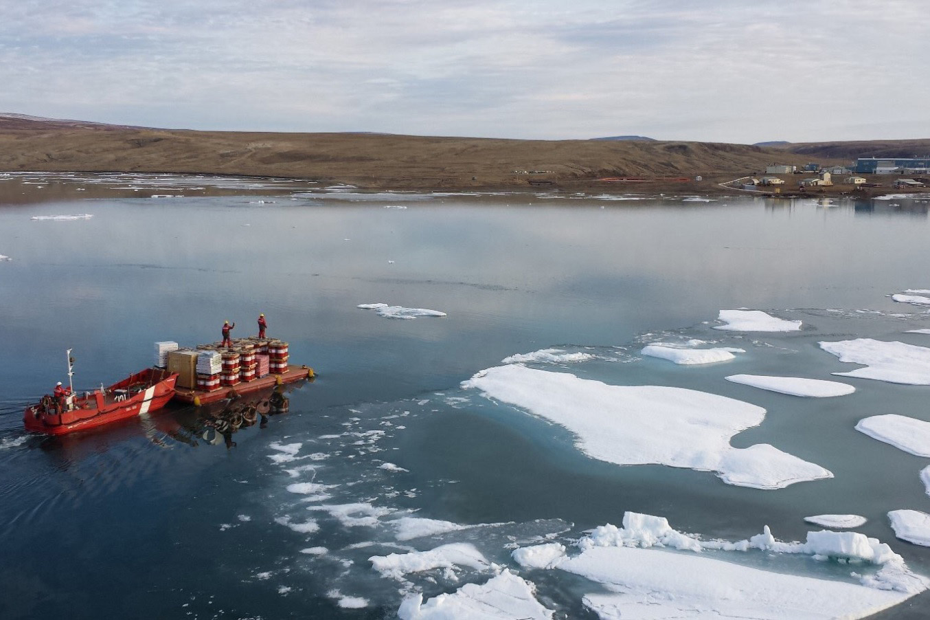 CCGS Des Groseilliers’ barge resupplying Eureka base station with fuel and cargo