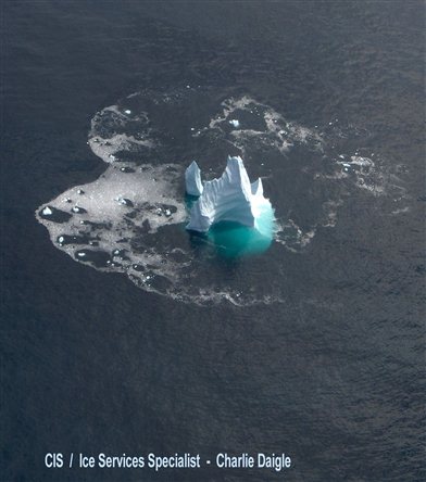 Calving iceberg (Courtesy of the Canadian Ice Service)